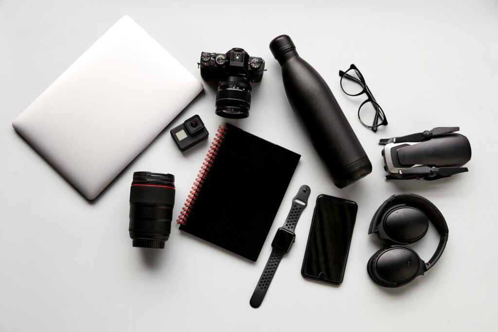 Flat Lay Shot Of Techno Items For Traveller With Smartwatch Mobile Phone And Wireless Headphones